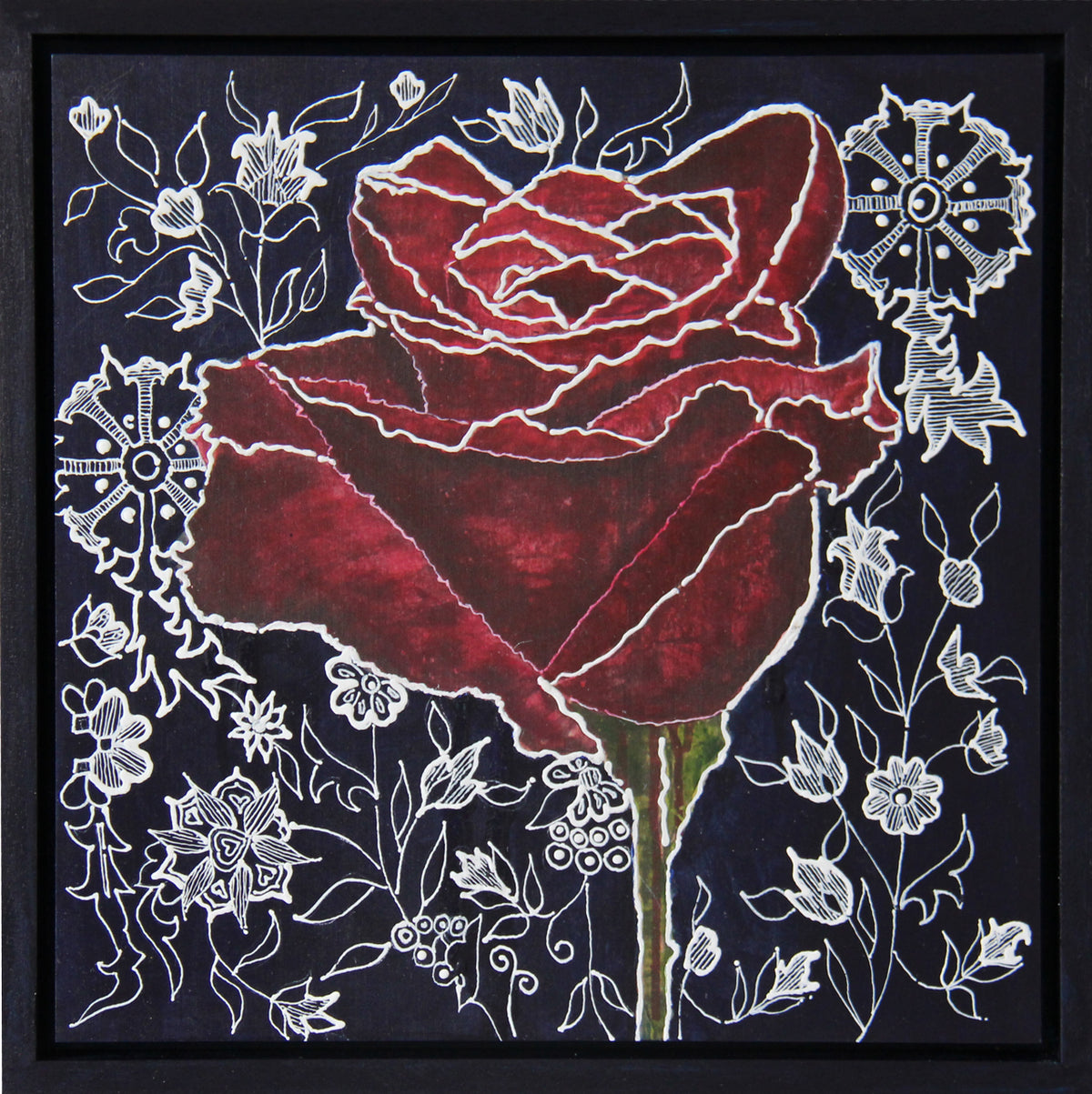 A framed square art print featuring a large textured crimson rose with white floral line art on a dark navy background, enclosed in a black frame.