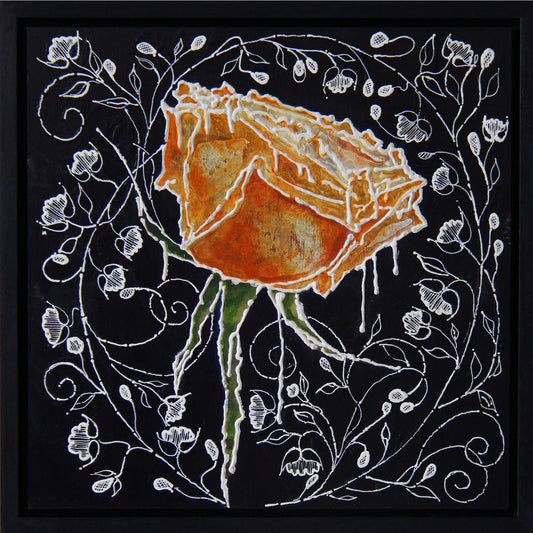 A square black-framed artwork featuring a large orange rose with white vine and leaf motifs on a black background.