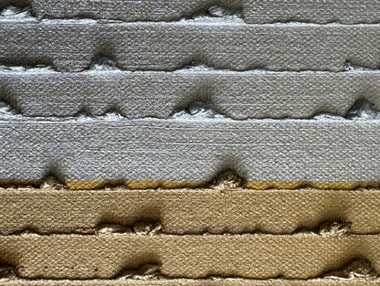 Close-up of a small gold striped square canvas oil painting with gold leaf.