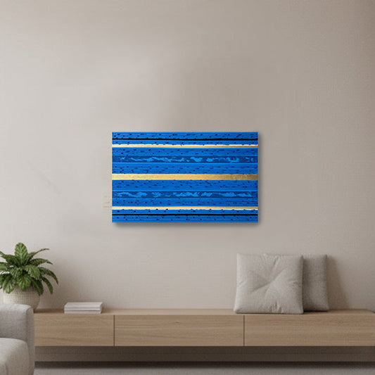 A modern living room with a floating wood console. The focal point is a square blue abstract wall art piece with horizontal textured stripes mounted on the wall.