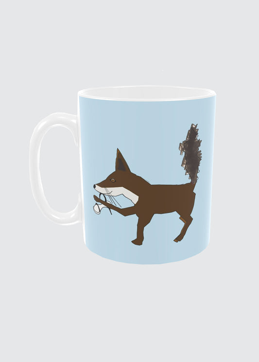 Mug with a fox design on a light blue background.