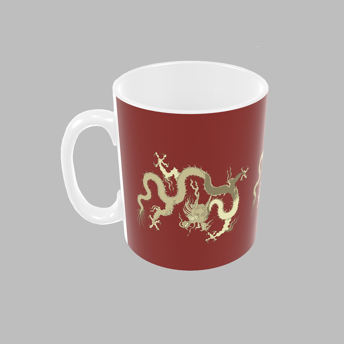 Red ceramic sturdy mug with a gold dragon design on a gray background.