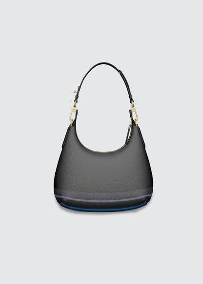 A black with stripes at the base, pebbled leather crescent bag with a black strap and gold-tone hardware, shown against a light gray background.