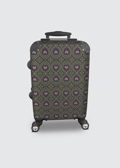 A hard-shell carry-on suitcase with a mocha and purple geometric pattern, featuring four spinner wheels and an extended telescopic handle, shown against a light gray background.