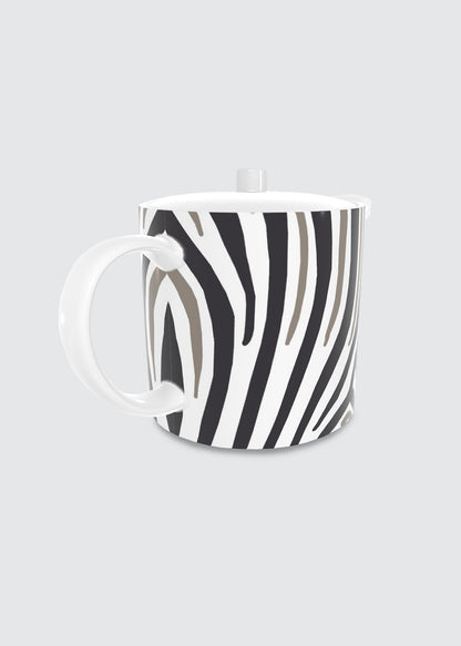 A white ceramic bone china teapot with a black and gray zebra stripe pattern, featuring a matching white lid and handle, set against a solid light gray background.