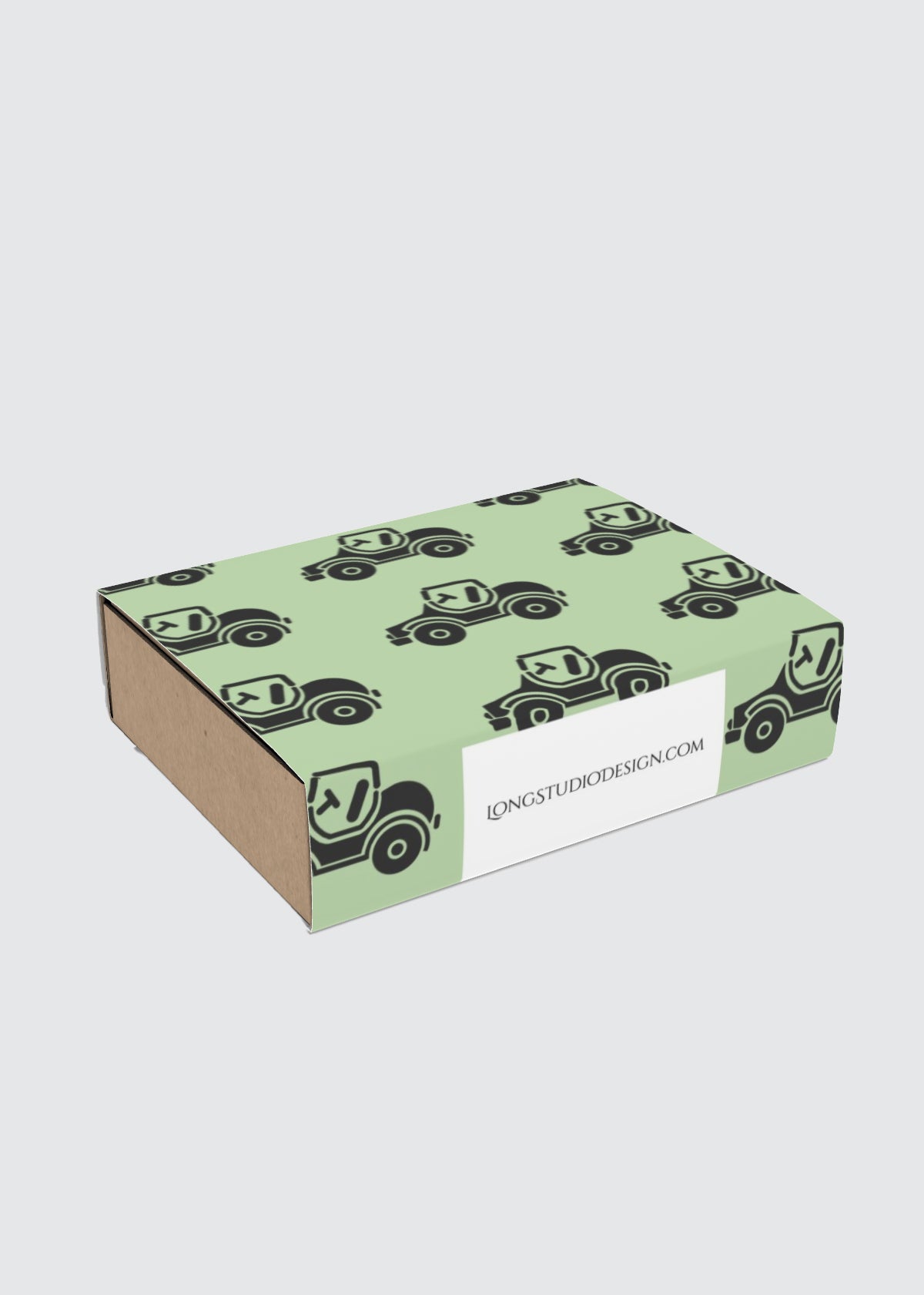 Green gift box with black car pattern and a visible brand label on a white background.