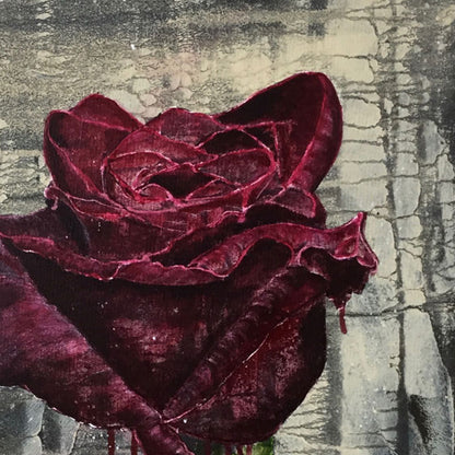 A close-up of a painting of a dark red rose with textured, dripping paint details against a distressed gray and beige background.