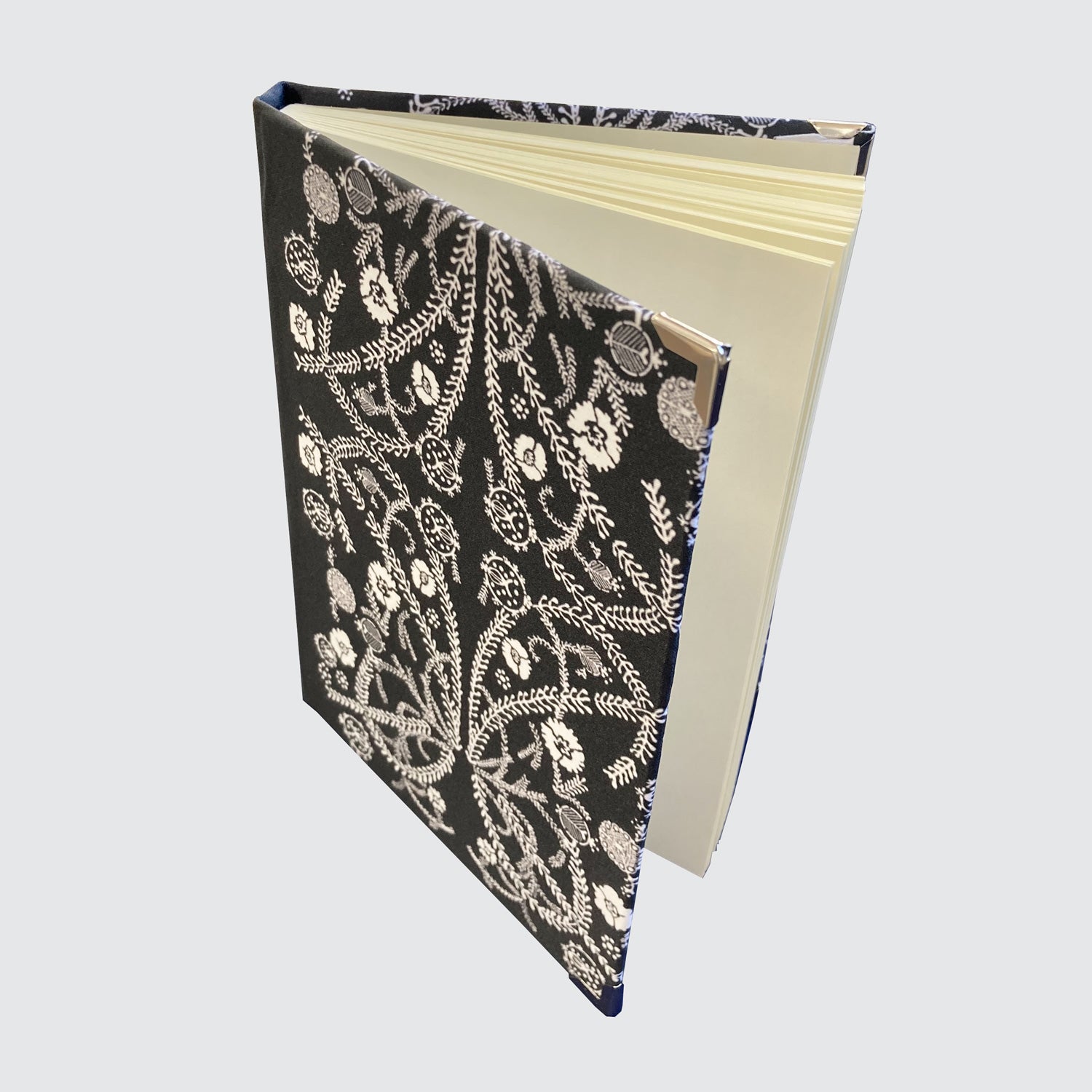 Satin hardback covered Journal with blank pages. Black with White Foliage design.