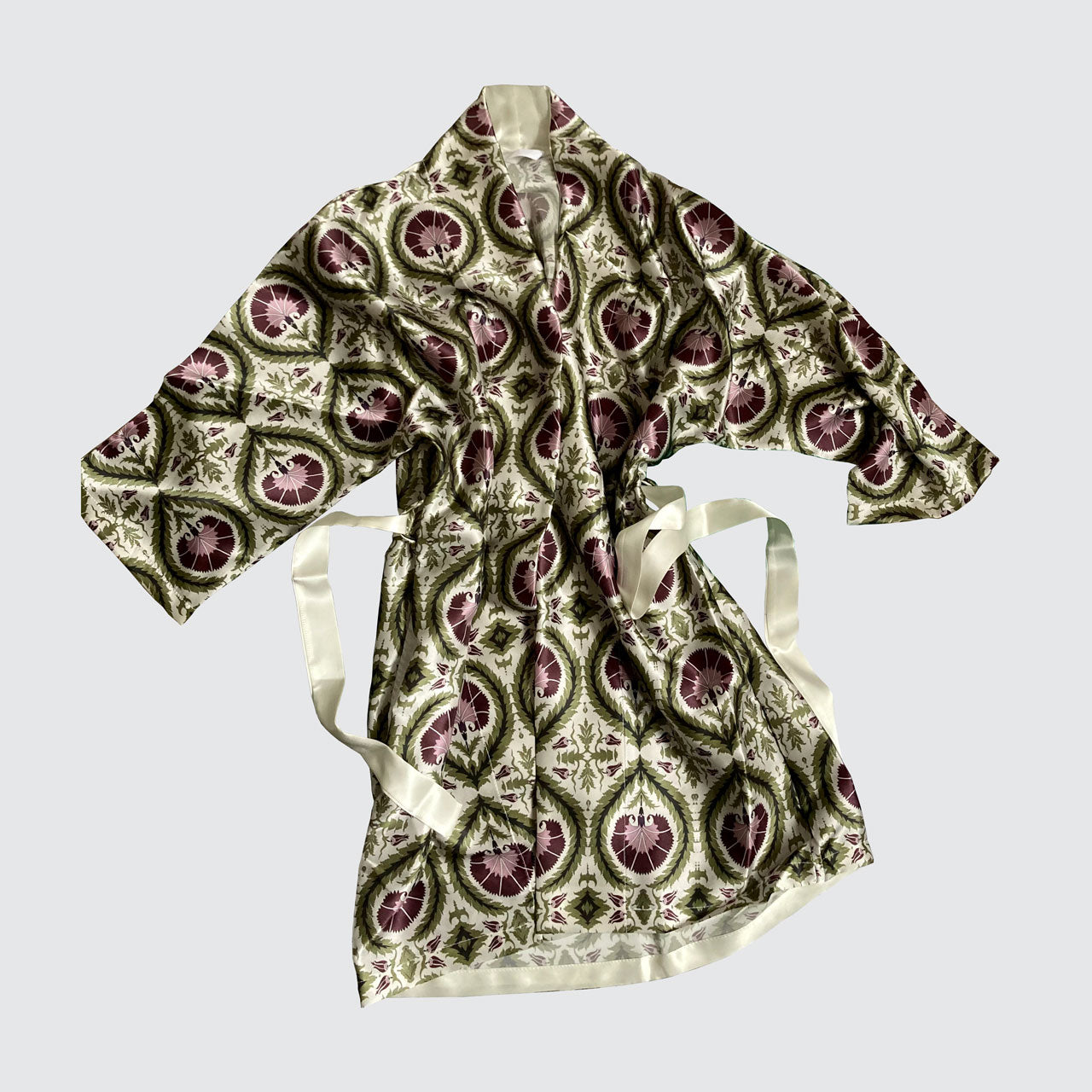 Real silk kimono with an acanthus and wreath design in green and purple on a white background